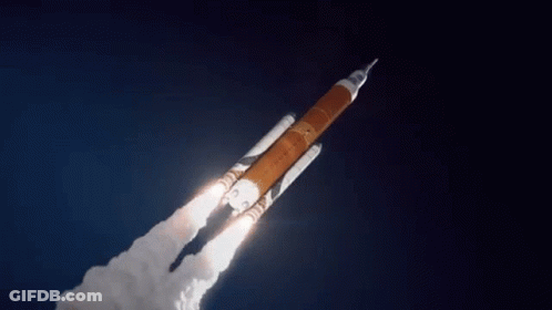 Rocket Flying In Dark Blue Sky GIF