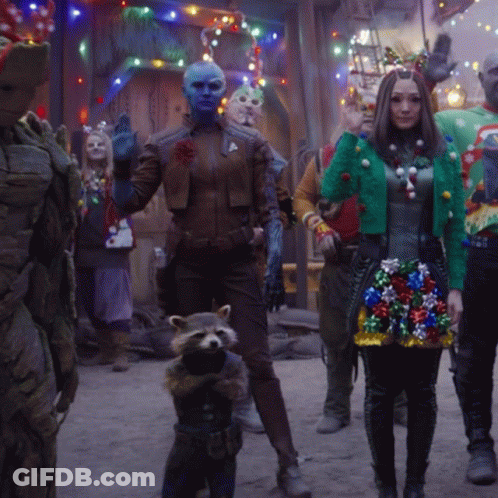 Rocket Raccoon And Groot In Ugly Christmas Sweaters GIF