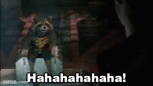Rocket Raccoon Laughing Sitting On Box GIF