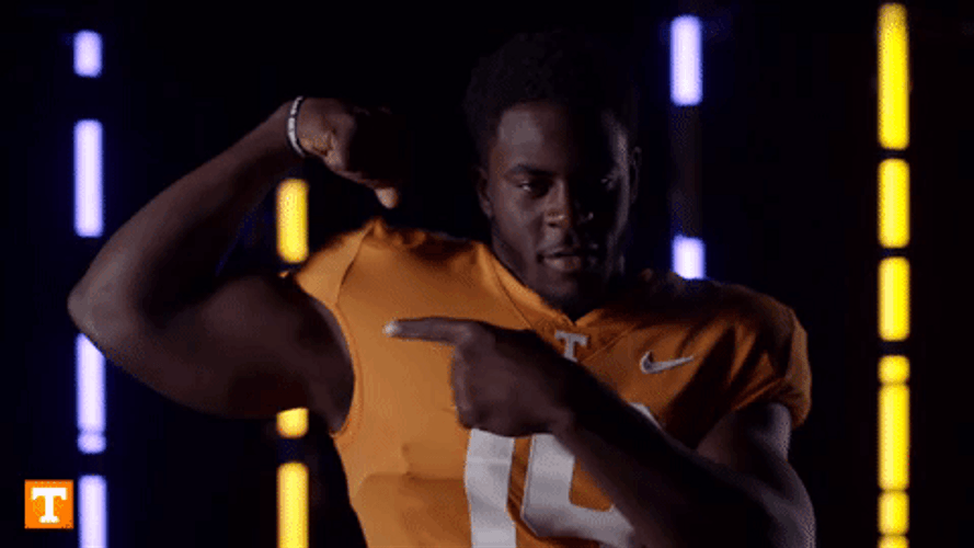 Rocky Top Football Player Flexing For Pose GIF