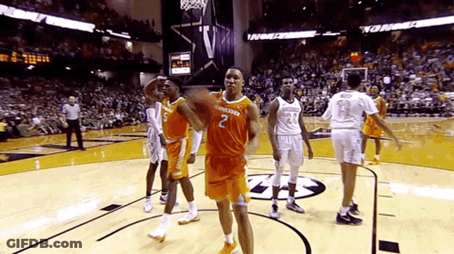 Rocky Top Player Flexing His Bicep GIF