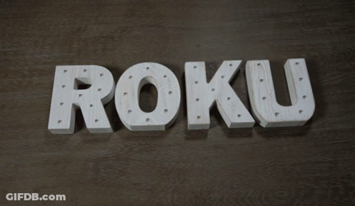Roku White Letters On Wooden Surface GIF