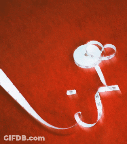 Roll Of Tickets Saying Admit One GIF