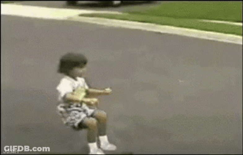 Roller Blading Kid Faceplant On Grass GIF