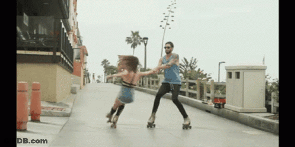 Roller Skating Couple Dancing GIF