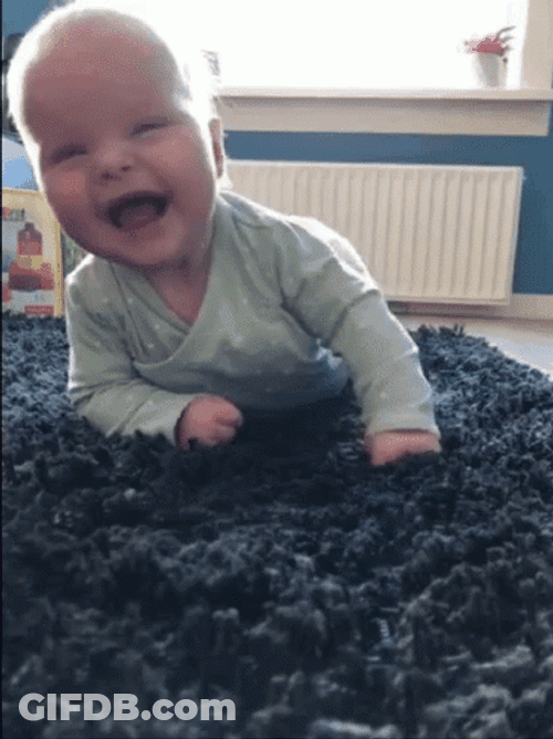 Rolling On Floor Laughing Little Boy GIF