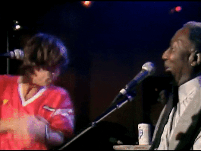 Rolling Stones Mick Jagger Drinking On Stage GIF