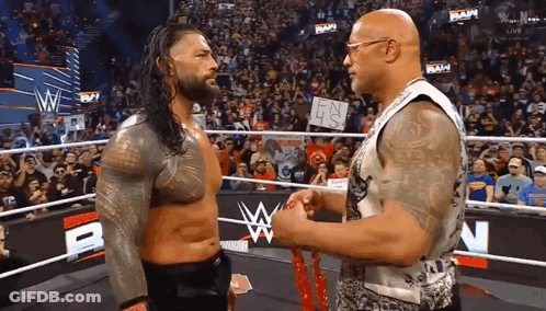Roman Reigns And The Rock Holding Hands GIF
