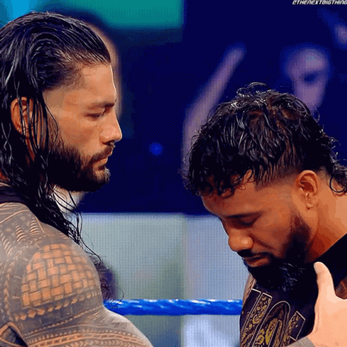 Roman Reigns Holds Jey Uso Head GIF