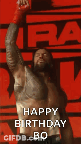 Roman Reigns In Red Glove Holding Microphone GIF