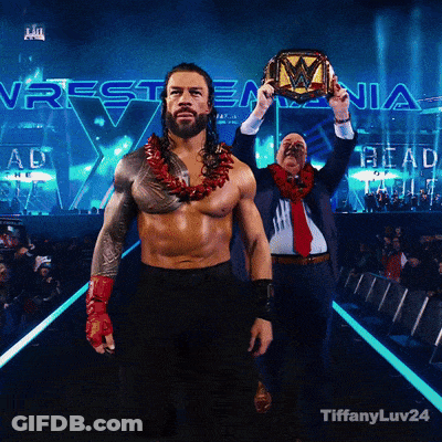 Roman Reigns Is Holding A Wrestlemania Championship Belt GIF