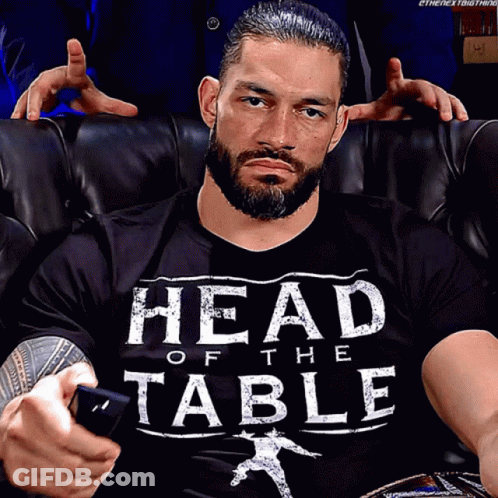 Roman Reigns Is Wearing A Head Of The Table T-Shirt GIF