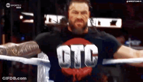 Roman Reigns Is Wearing A T-Shirt With The Word Gtc On It . GIF