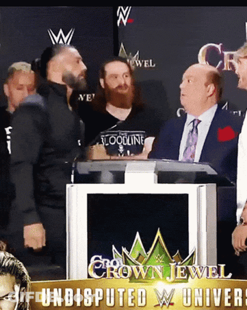 Roman Reigns Logan Paul GIF