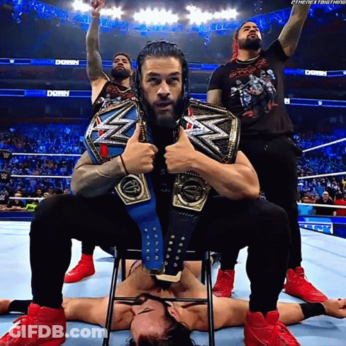 Roman Reigns Sitting With Wrestling Belt GIF
