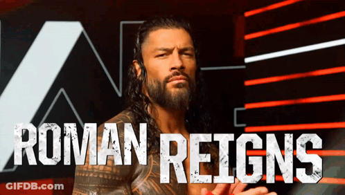 Roman Reigns Standing In Front Of Sign Saying A GIF