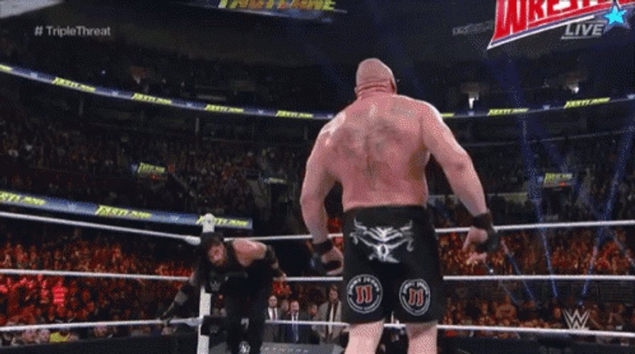 Roman Reigns Tackle Knock Down GIF