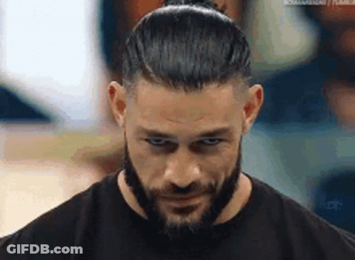 Roman Reigns With Beard And Bun GIF