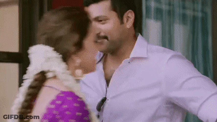Romantic Pair Happily Hugging GIF
