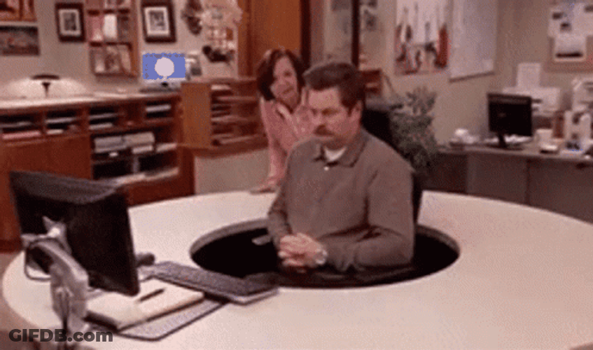 Ron Swanson Spinning In Front Of Computer GIF