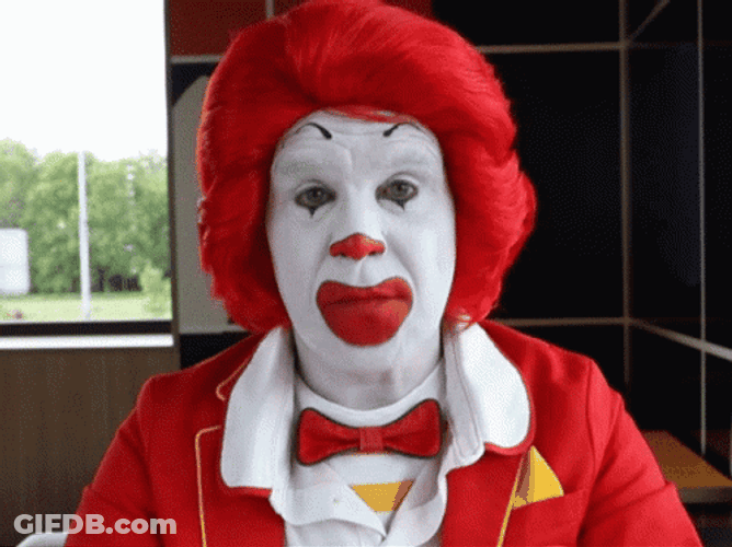Ronald Mcdonald Covering His Ear GIF