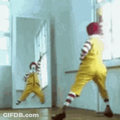 Ronald Mcdonalds Clown Posing At Mirror Funny GIF