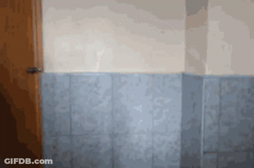 Room Corner With Door And Blue Tiles GIF