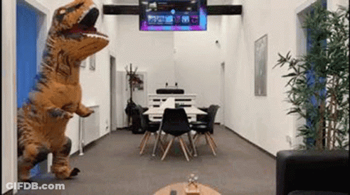 Room With T-Rex Costume Table And Chairs GIF