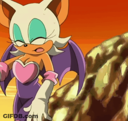 Rouge The Bat Standing In Front Of A Rock GIF