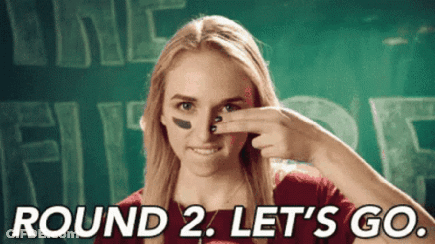 Round 2 Woman Putting Mark On Face GIF