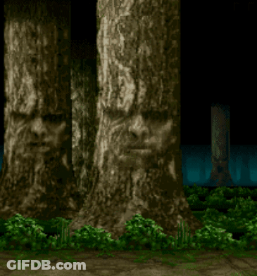 Row Of Carved Face Trees GIF