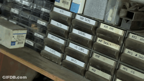 Row Of Drawers Labeled Nuts Bolts Screws Ice Cubes Nails GIF