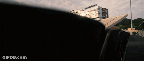 Row Of Empty Seats In Front Of Building GIF