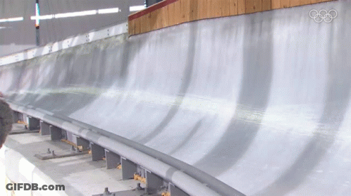 Row Of Empty Seats With Olympic Rings GIF