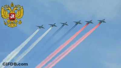 Row Of Fighter Jets Flying With Russian Coat Of Arms GIF