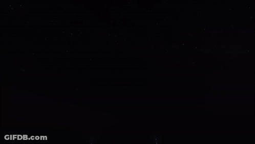 Row Of Fireworks In Dark GIF