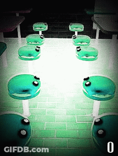 Row Of Green Chairs In Dark Room Number 0 GIF