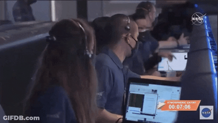 Row Of Nasa Employees Busy Working GIF