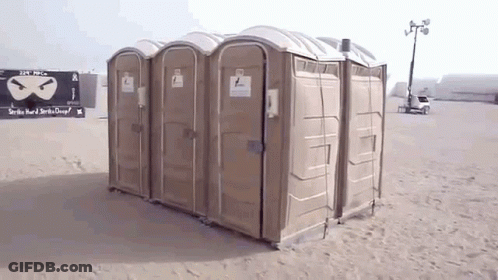 Row Of Portable Toilets With Strike Hard And Strike Clean Sign GIF