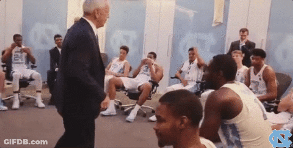 Roy Williams Exchanging High Five GIF