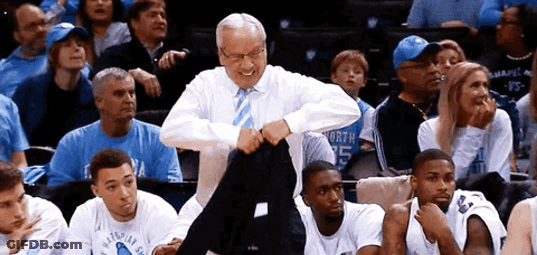 Roy Williams Waving His Coat GIF