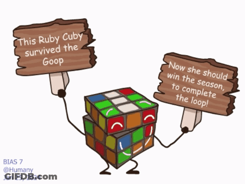 Rubik's Cube Holding Sign Saying This Ruby Cuby Survived The Goop GIF