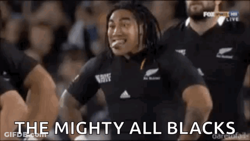 Rugby Player Making Funny Face In Black Shirt GIF