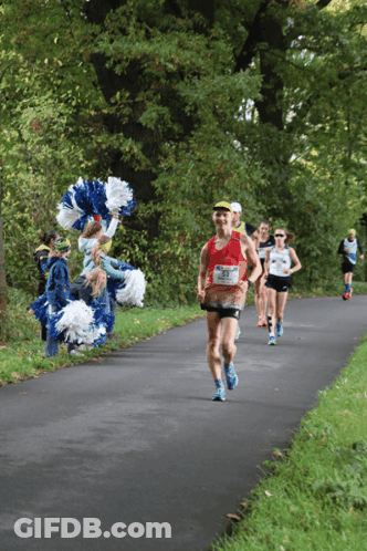 Runners Running Down Path GIF