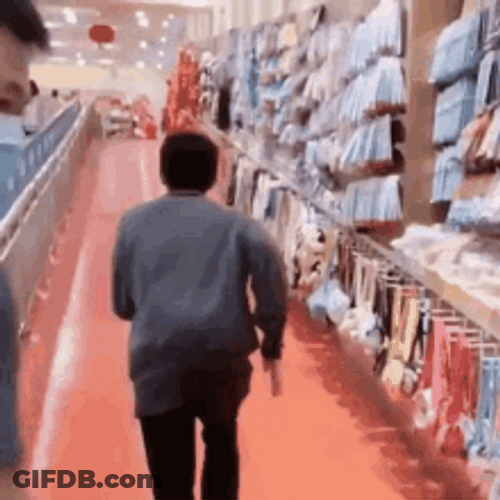 Running Away Fast In The Mall GIF