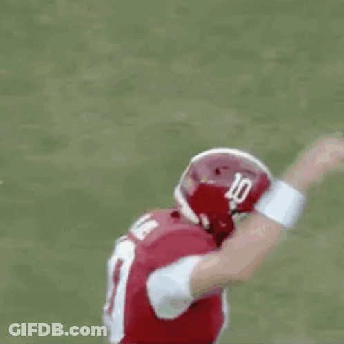 Running Football Player In Red Uniform And Helmet GIF