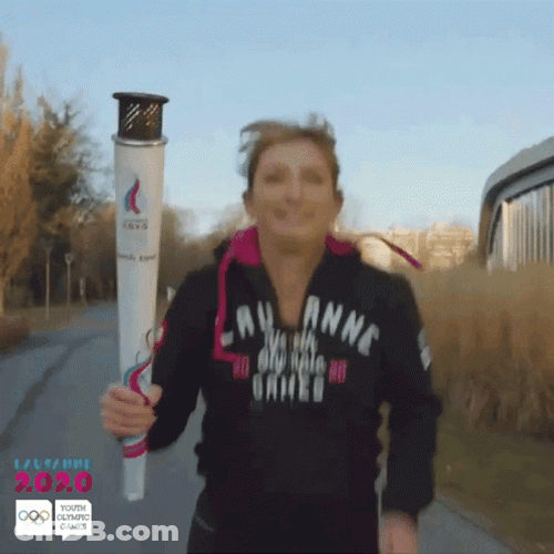 Running With Olympic Torch GIF