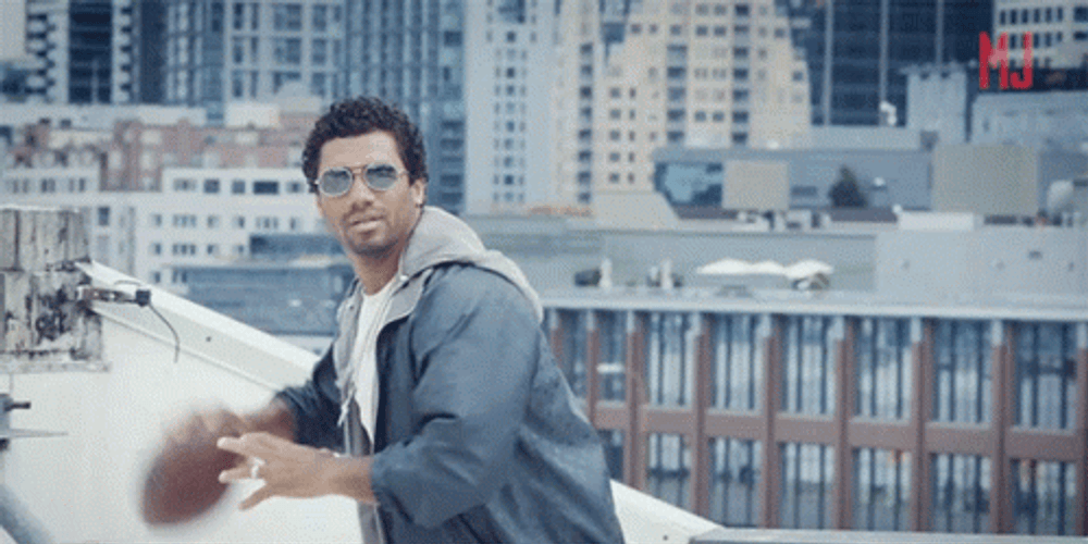 Russell Wilson Football Photoshoot GIF