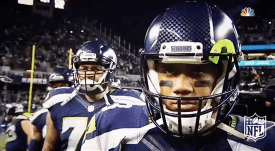 Russell Wilson Shaking Shoulders GIF