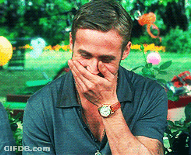 Ryan Gosling Laughing While Covering His Mouth GIF